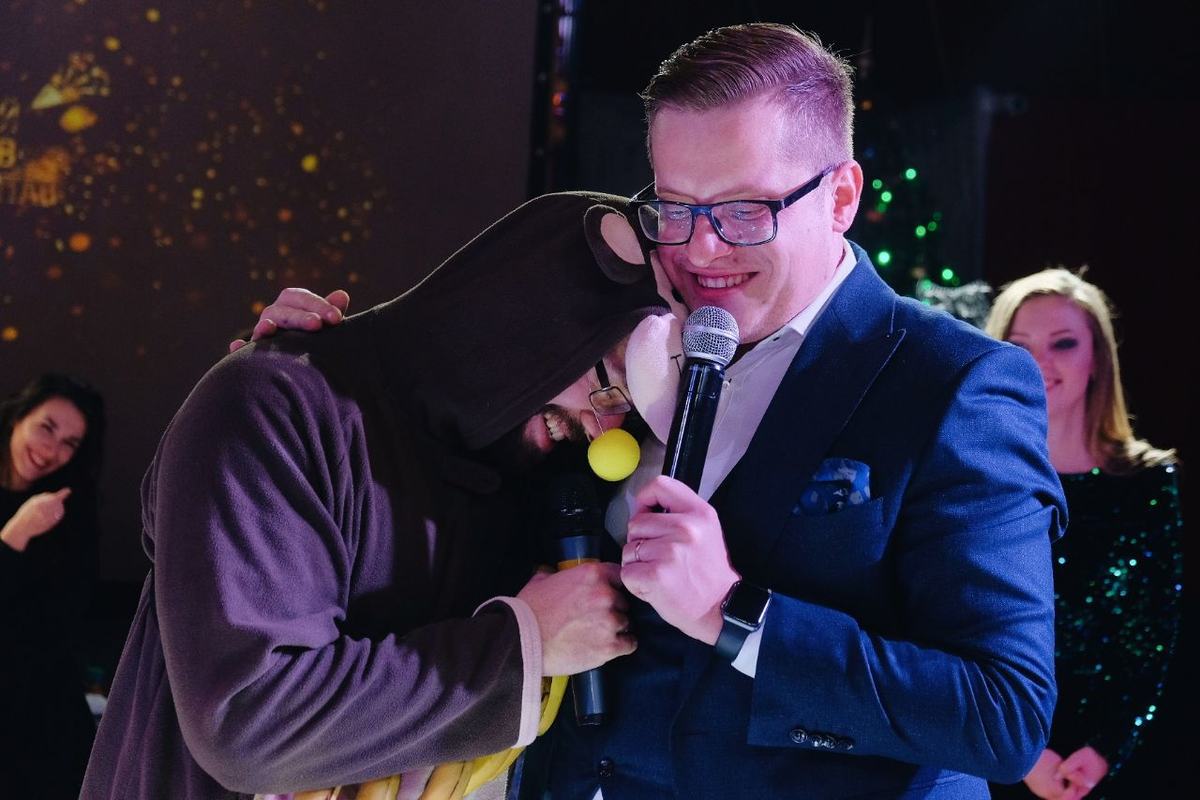 Valerij Mitejko hosting a corporate event