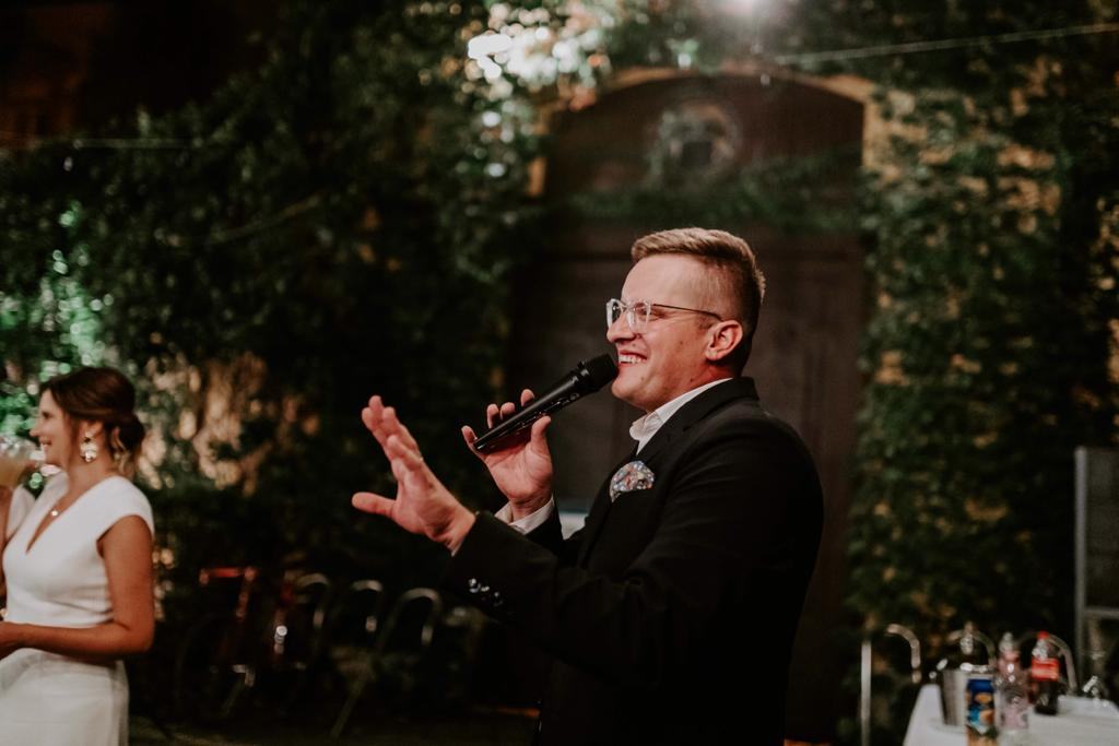 Valerij Mitejko hosting an evening wedding reception